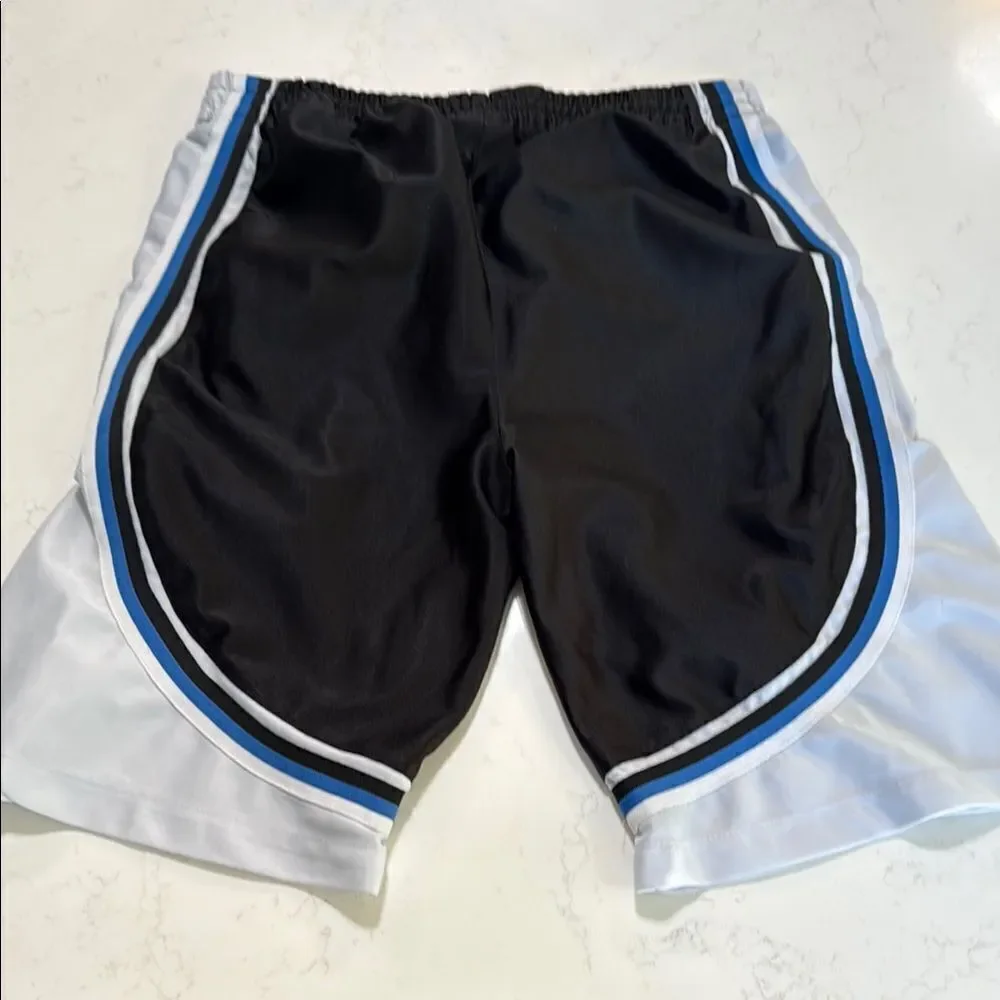 Getaway athletic shorts.  Youth Black and White Athletic Shorts.  Size large.